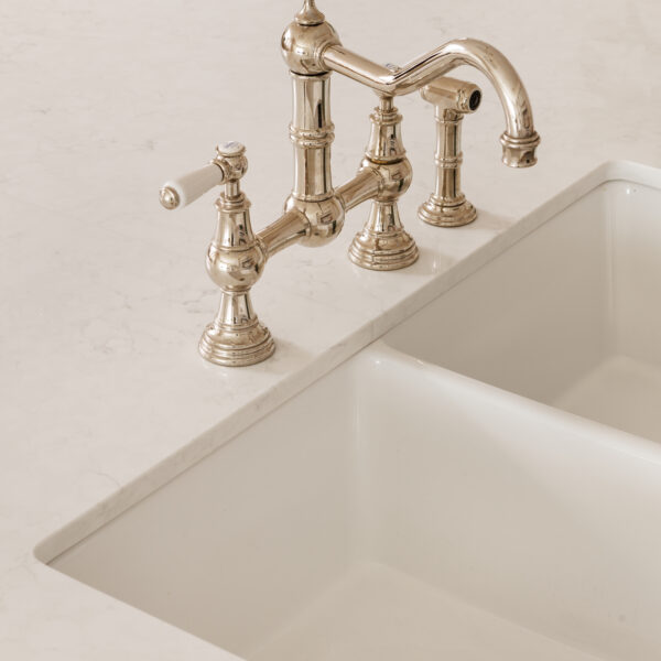 Elegant kitchen sink with a vintage chrome faucet