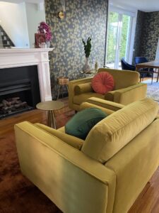 Colourful interior with mustard armchairs in Beaumaris Project Gallery