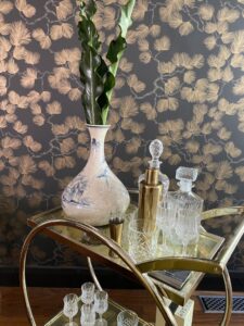 Elegant bar cart in Beaumaris Project Gallery with glassware and vase