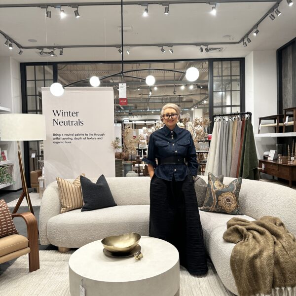 Designer in a Melbourne interior design gallery with modern decor