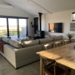 Spacious living room in the Peterborough Project gallery with sectional sofa.