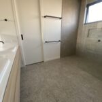 Modern bathroom with dual sinks in the Peterborough Project gallery